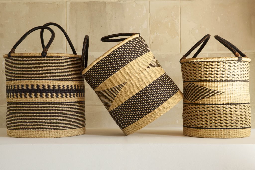 Laundry Baskets with leather handles.
